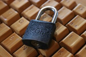 padlock on a wooden keyboard