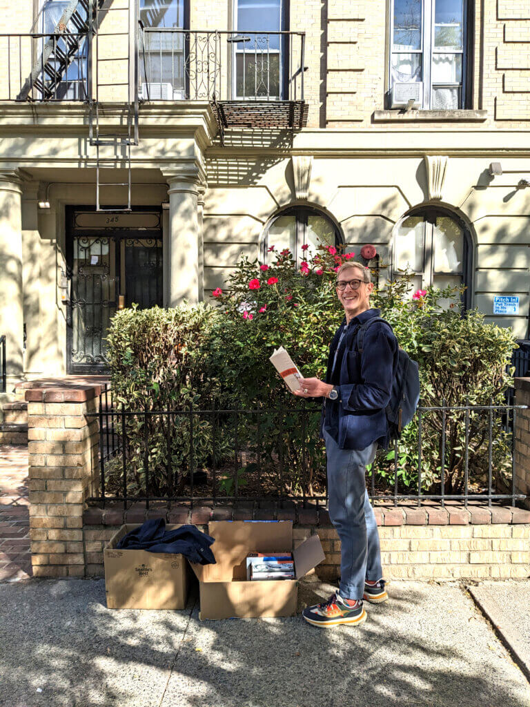 box of books on a street in Brooklyn